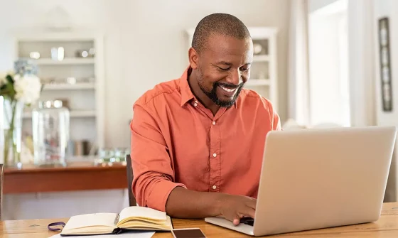 Man working at desk in home office