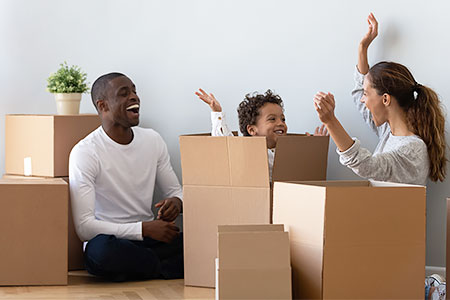 Family unpacking after a move - BigSteelBox