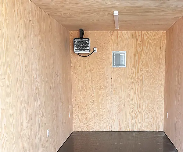 Plywood interior wall panel package in modified shipping container - BigSteelBox